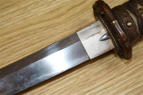 A WW2 Japanese katana with standard mounts, the blade with wavy hamon 98cm